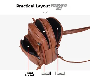 Detail view of brown multi-layer crossbody bag showing front pocket and main compartments