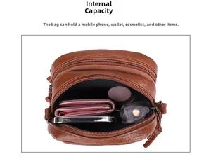 Internal view of brown leather crossbody bag showing multiple zipper compartments and storage