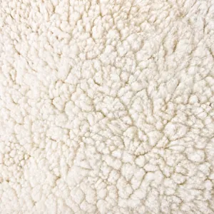Detailed macro view of soft white plush fabric texture for the cartoon chicken bag