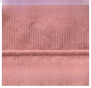 Detailed macro view of pink corduroy fabric texture with clean stitching for tote bags