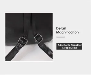 Close-up of adjustable shoulder straps with silver metal buckles on a black leather backpack