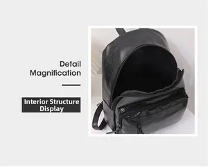 Interior structure of black pebbled leather backpack showing spacious compartments and zippers
