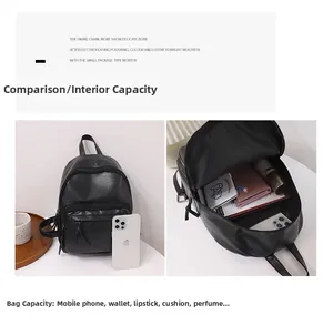 Detail view of mini black leather backpack capacity showing daily essentials fit