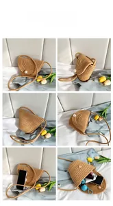 Detail view of woven straw bucket bag showing internal capacity for phone and cosmetics