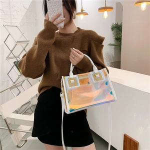 Chic holographic transparent handbag with white leather trim and a gold buckle fastener