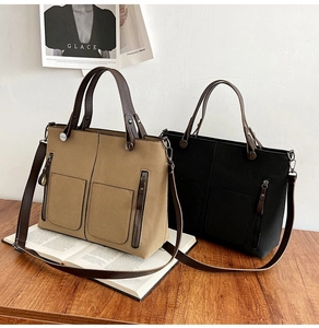Retro khaki and black frosted leather tote bags with front pockets and leather straps
