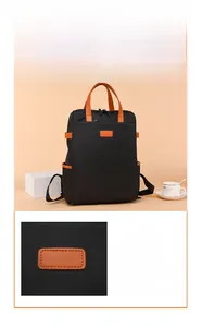 Details des wasserdichten Nylon-Rucksacks mit orangefarbenem PU-Leder und Taschen
