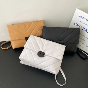 Quilted V-pattern crossbody flap bag in black, camel, and white colors with chain strap