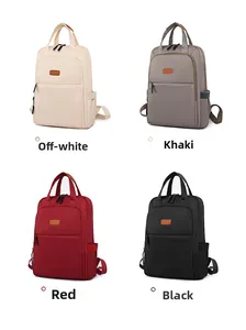 Oxford fabric backpack detail showing white, khaki, red, and black color options