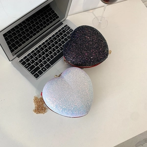 Chic heart-shaped sequin crossbody bags in iridescent white and dark purple finishes