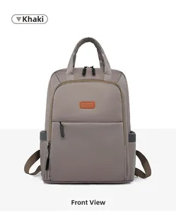 Front view of khaki waterproof oxford backpack with leather label and multiple pockets
