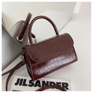 Vintage wine red faux crocodile leather handbag with round top handle and gold hardware