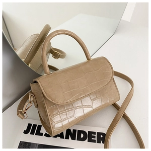 Elegant beige croco-embossed small handbag with gold hardware and top handle for women