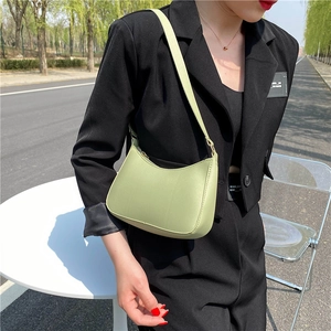 Minimalist light green leather hobo bag for women in stylish half-moon shape