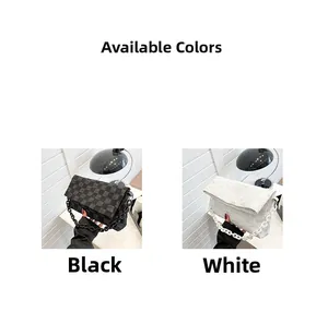 Detail view of stylish quilted chain handbags in black grid and white floral textures