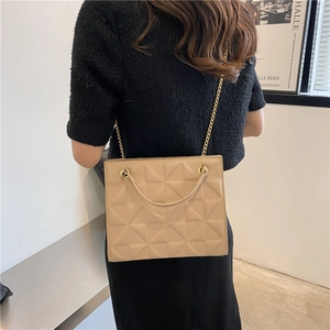 Minimalist beige geometric diamond lattice tote bag with golden metal chain strap