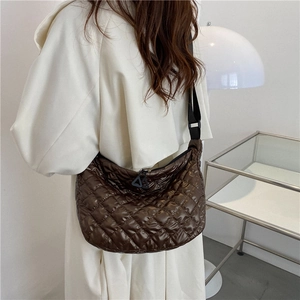 Brown quilted crossbody cloud bag with adjustable strap and large capacity casual style