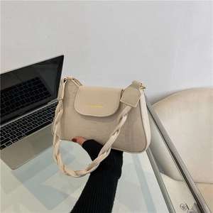 Chic cream white crossbody bag with embossed checkered texture and twisted woven handle