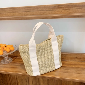 Large khaki straw tote bag with white cotton straps for summer camping and picnics