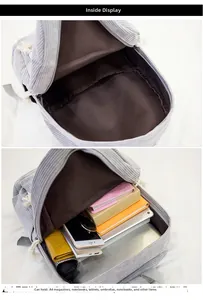 Detailed interior of grey corduroy backpack showing large capacity for A4 books and laptop