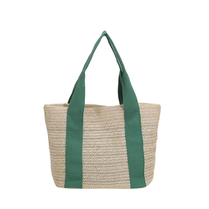 Large summer straw tote bag with green canvas straps and V-weave pattern for picnic