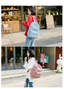 Outdoor lifestyle shot of sky blue and light pink corduroy backpacks for students