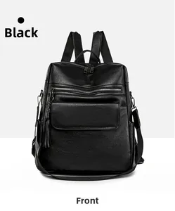 Front view of black pebble leather backpack with multiple zip pockets and metal D-ring details
