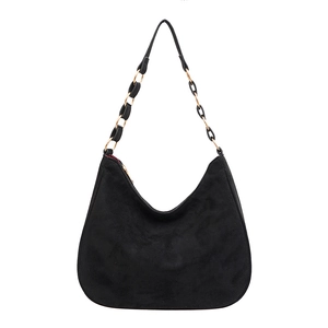 Minimalist black matte underarm shoulder bag with metal chain strap and red lining accent