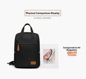 Waterproof black nylon backpack showing capacity relative to A4 size magazine