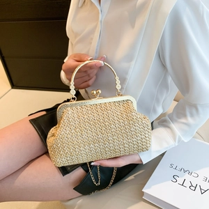 Retro beige woven straw shell bag with ornate gold metal handle and chain strap