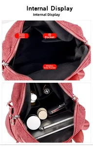 Red corduroy backpack with interior compartments showing pockets and storage space