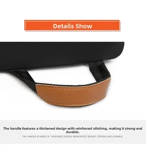 Detail of reinforced backpack handle with black webbing and brown leather trim