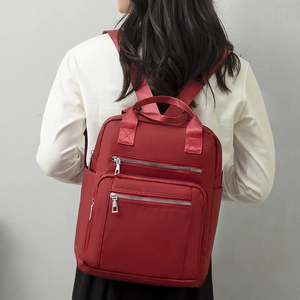 Sac à dos en nylon rouge foncé pour femme avec poches zippées et grande capacité