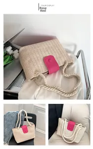 Détail du rabat en cuir rose et de la poignée en corde de coton sur le sac en paille