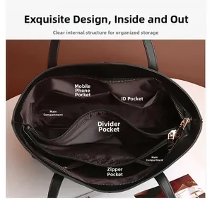 Detailed interior of a black leather tote showing compartments and a zipper pocket