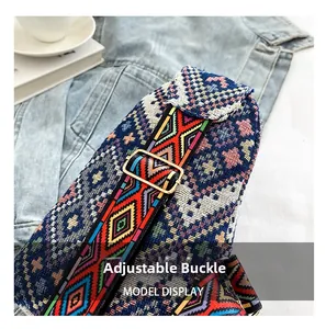 Detailed close-up of adjustable golden metal buckle and ethnic patterned woven shoulder strap