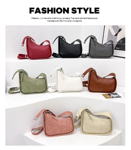 Multi-color crocodile pattern half-moon bags displayed on steps in a minimalist layout