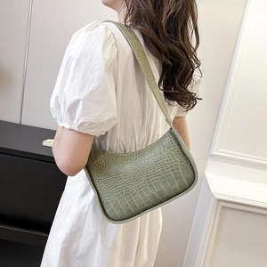 Minimalist green crocodile pattern shoulder bag for women with elegant half-moon shape