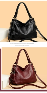 Detail of lychee pattern PU leather tote bags with tassel charm in black and burgundy