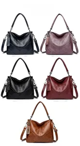 Detailed display of five color options for a chevron-stitched crossbody bag with tassels