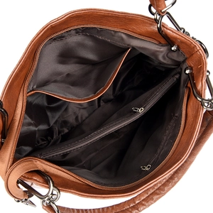 Interior view showing multiple compartments and zip pocket of a brown leather shoulder bag