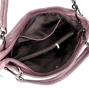 Detail view of the interior layout with zipper pockets and polyester lining in a purple bag