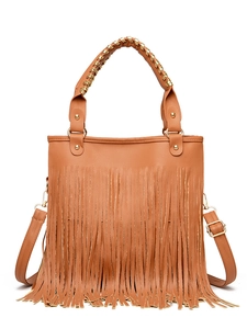 Detailed view of brown fringe handbag with lychee texture and woven metal handles