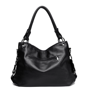 Classic black PU tote bag with litchi texture, double handles and woven side details