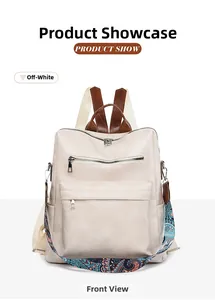 Front view of beige leather backpack with decorative ethnic patterned shoulder strap