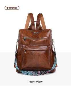 Front detail of brown vintage backpack with leaf embossed texture and ethnic strap