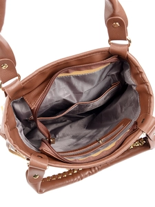 Top view of brown leather handbag interior with multiple compartments and gold zipper