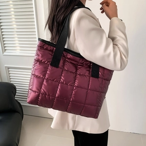 Chic quilted oversized wine red tote bag with black straps for autumn and winter outfits