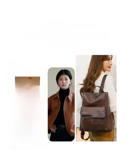 Detail of dark brown vintage PU leather backpack with metallic rivets and zipper pocket