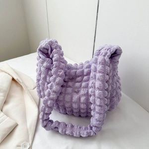 Detailed view of lavender bubble texture on pleated cloud shoulder bag for women
